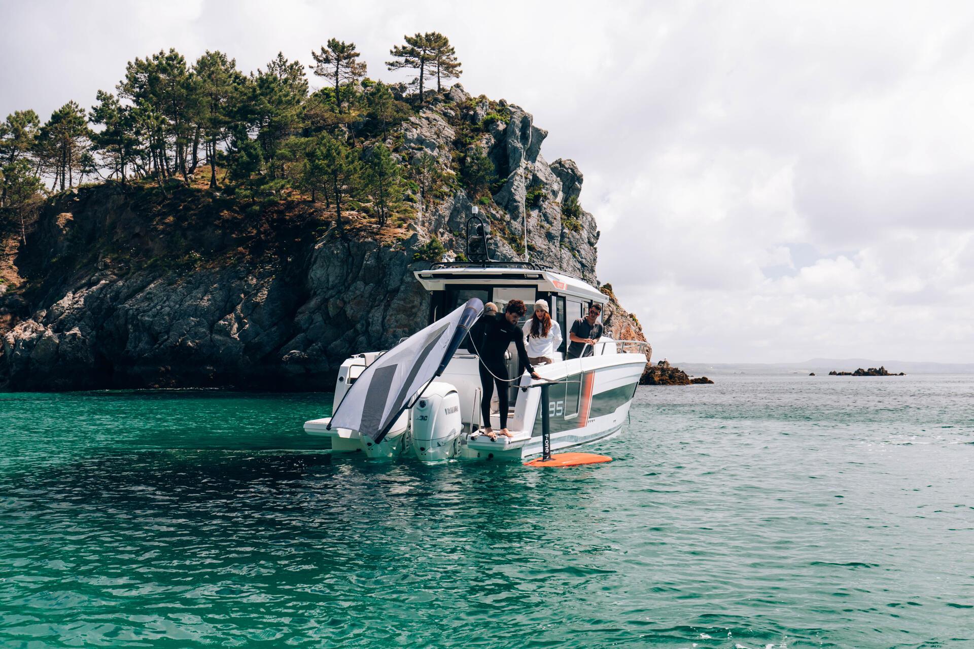 a group of people on a boat Merry fisher 895 S2 in the water